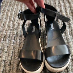 Black ankle platform sandals by Mia